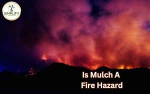 A photo showing a pile of mulch engulfed in flames, emitting thick smoke. Demonstrating how to be safe in a burning mulch.